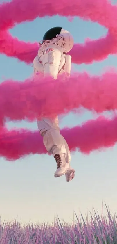 Astronaut floating in pink smoke rings over a field, creating a surreal scene.