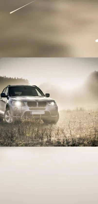 SUV driving through mystical misty morning landscape.