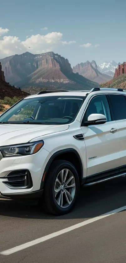 White SUV in a stunning desert landscape with mountains.