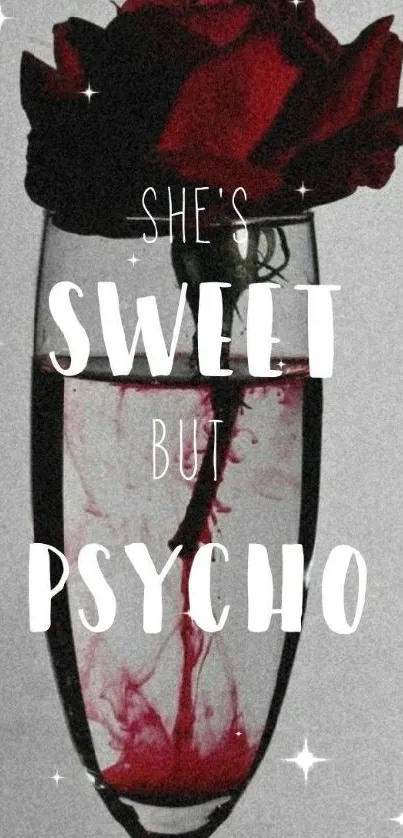 Red rose in glass with 'Sweet But Psycho' text.