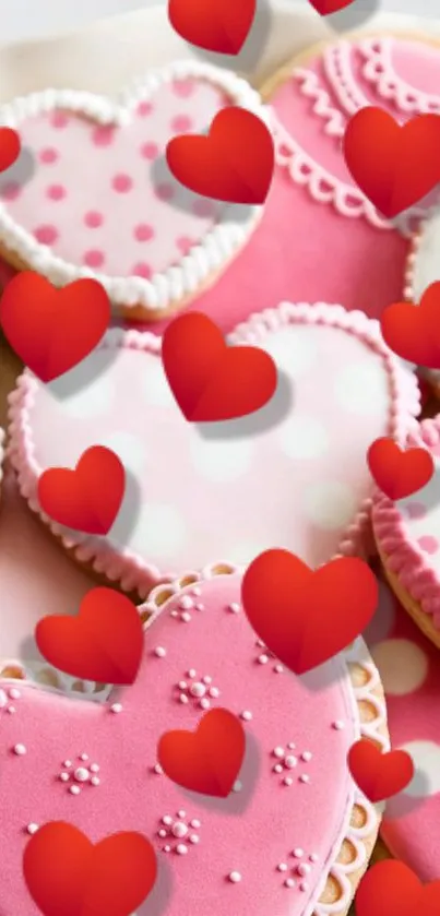 Heart-shaped pink cookies with red hearts.