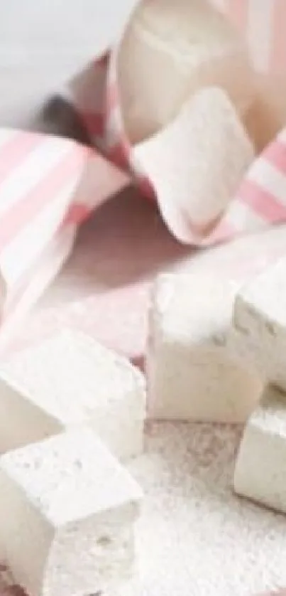 Soft pastel marshmallows in pink and white tones, creating a delightful wallpaper.
