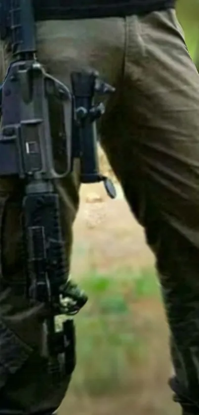 Tactical gear with soldier in outdoor setting.