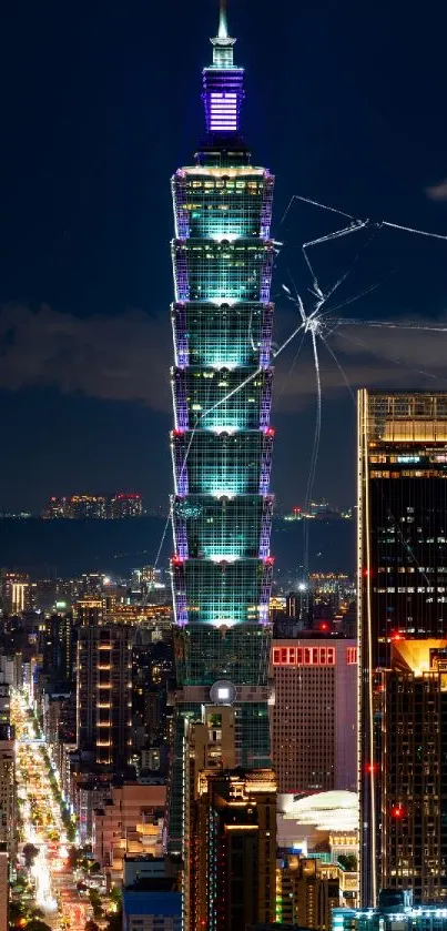 Taipei 101 tower illuminated against night sky, vibrant urban skyline.