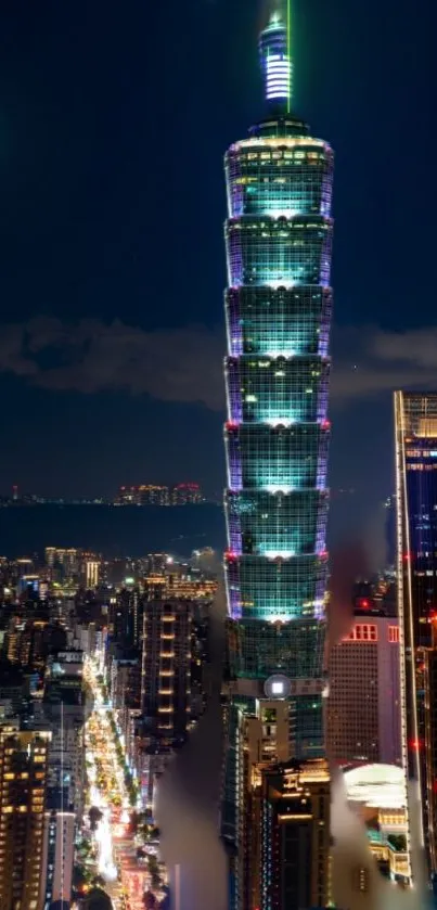 Taipei 101 illuminated against night sky, vibrant urban skyline view.