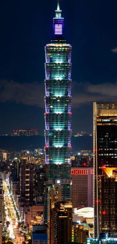 Taipei 101 illuminated at night with vibrant cityscape.