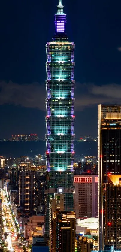 Taipei 101 tower illuminated against the night sky, showcasing vibrant city lights.