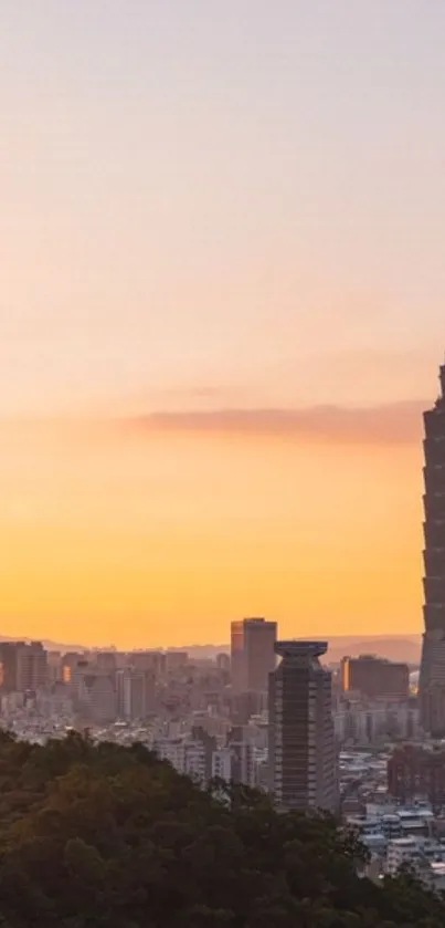 Taipei city skyline at sunset with vibrant peach sky and silhouette skyscrapers.