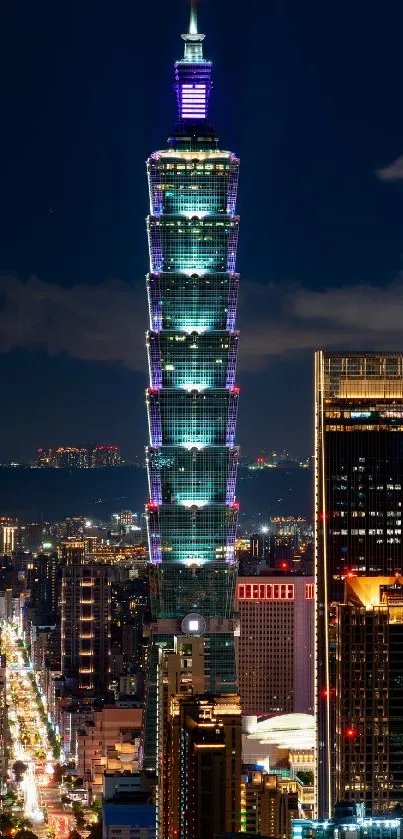 Taipei 101 tower illuminated at night with a vibrant cityscape.