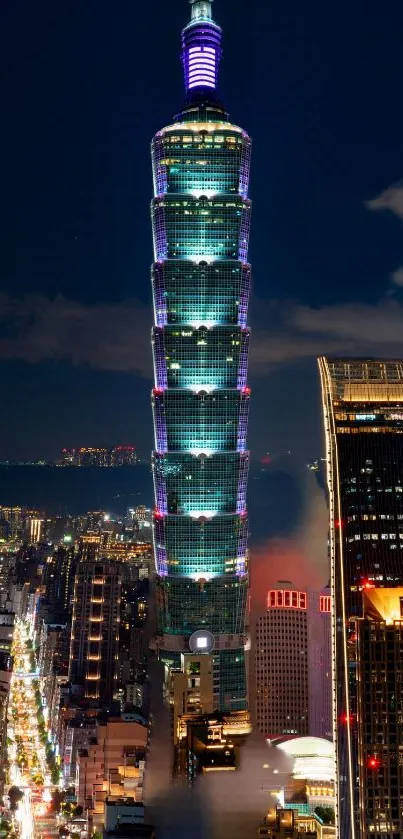 Taipei night skyline with illuminated tower and city lights.
