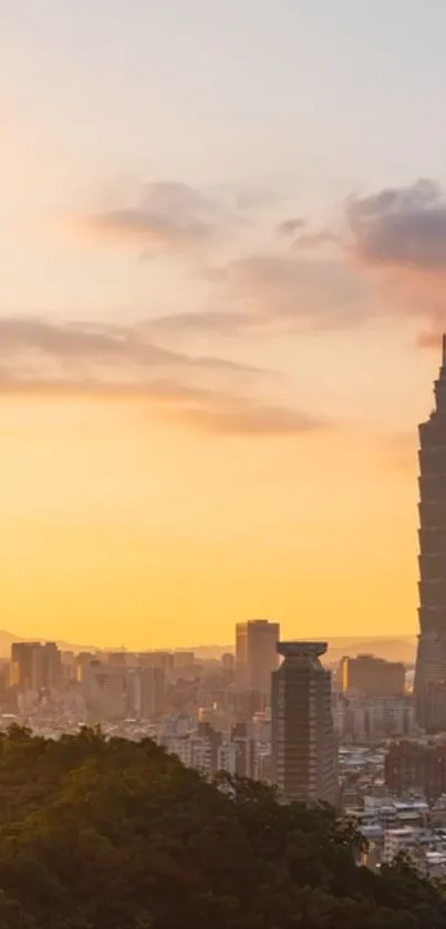 Taipei 101 tower at sunset with cityscape and golden sky.