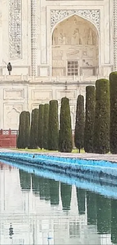 Taj Mahal reflects in calm water, elegant and timeless.