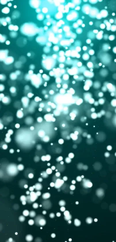 Abstract teal bokeh wallpaper with glowing lights.