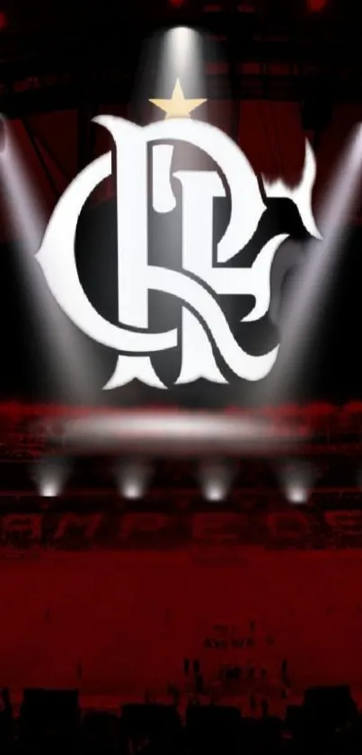 Mobile wallpaper of a spotlighted team logo on a red background in a stadium.