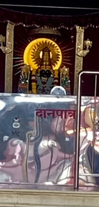 Intricate temple shrine with spiritual symbols and devotional elements.