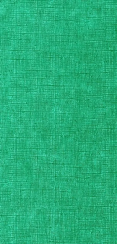 Vibrant textured green wallpaper pattern.