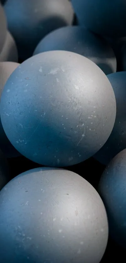 Close-up view of textured gray spheres in a modern abstract design.