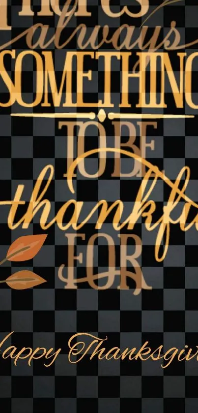 Thanksgiving wallpaper with gratitude message on a black and orange background.