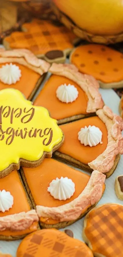 Thanksgiving themed cookies in orange and yellow hues with 'Happy Thanksgiving' message.