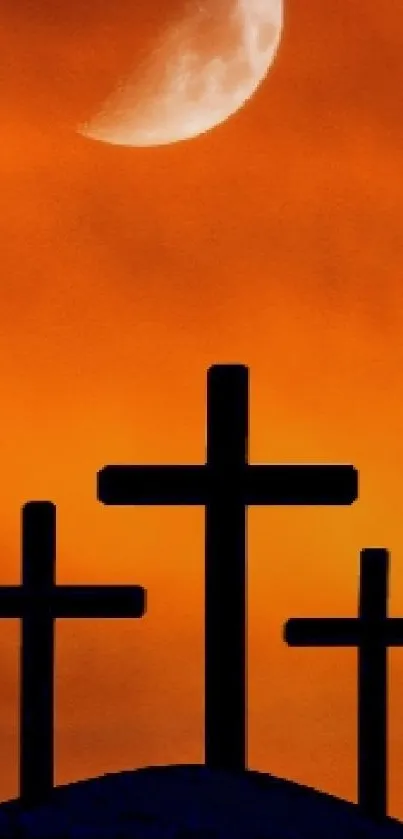 Three crosses silhouetted against an orange sunset with a crescent moon overhead.