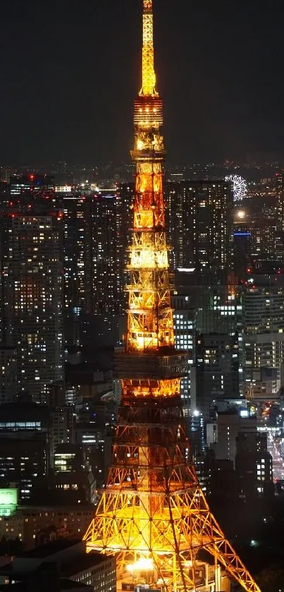 Tokyo Tower glowing at night amidst city lights.