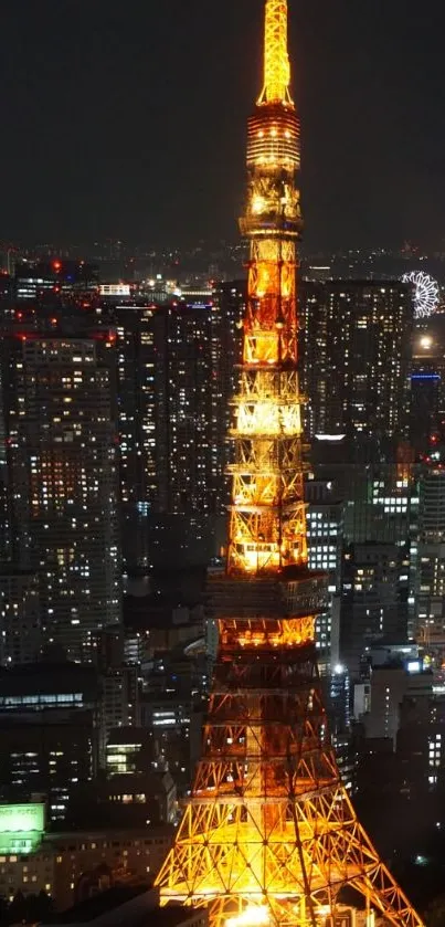 Tokyo Tower illuminated at night with city skyline in the background.