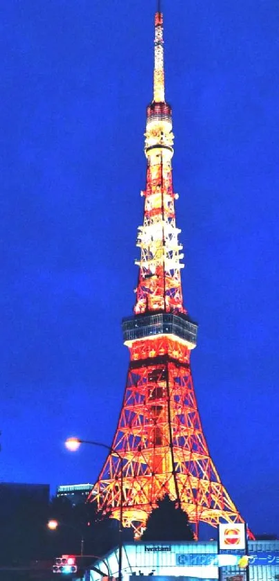 Vibrant view of Tokyo Tower at night with city lights.