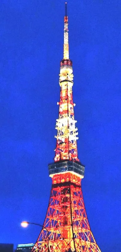 Vibrant night view of Tokyo Tower with a backdrop of city lights.