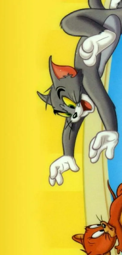 Tom and Jerry cartoon wallpaper with a yellow background.