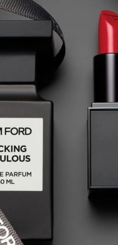 Tom Ford perfume with red lipstick on black background.