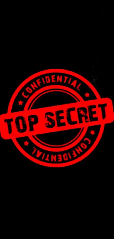 Top Secret red stamp on black background wallpaper.