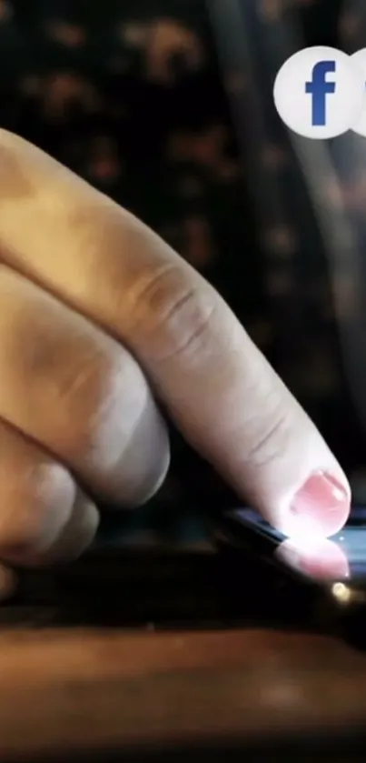 Close-up of a finger interacting with a smartphone screen in warm lighting.