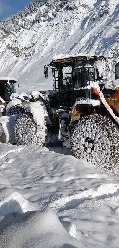 Tractors maneuver through snow-covered mountain roads in winter.