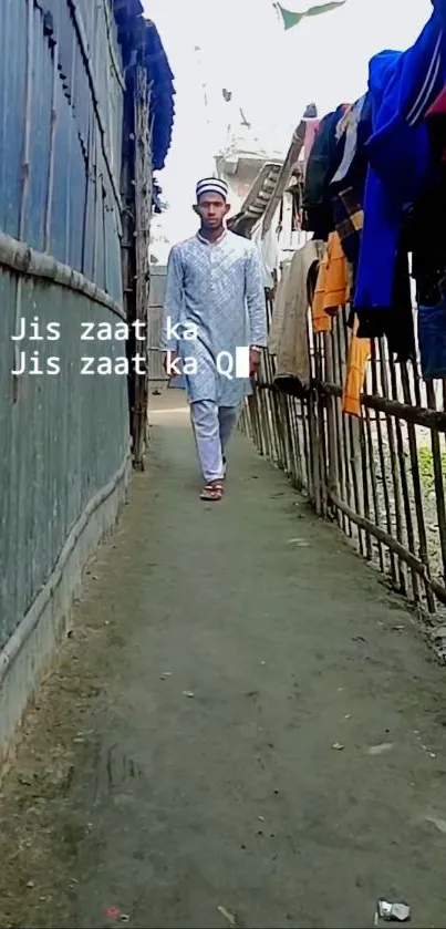 Man walking through a narrow alley in traditional attire.