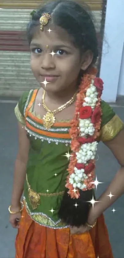 Young girl in traditional Indian dress with floral accents.