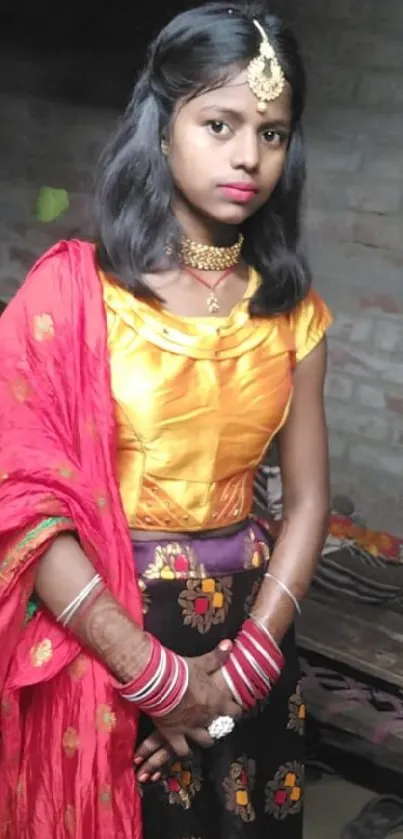 Stylish woman in traditional vibrant attire.