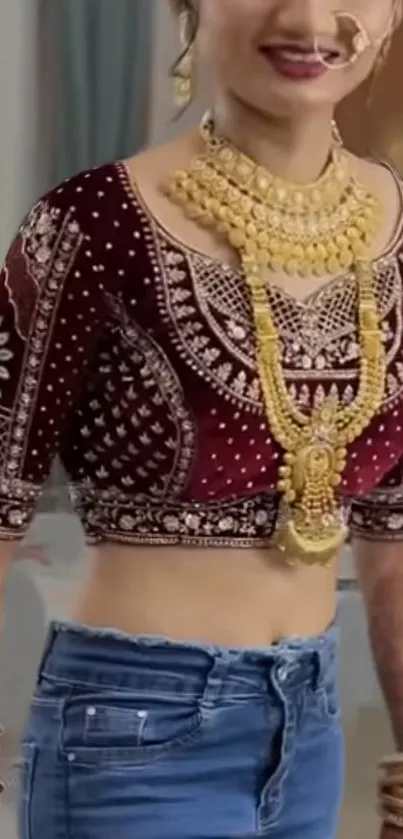 Woman in traditional dress with gold jewelry.