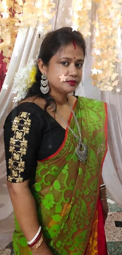 Woman in vibrant green sari with ornate jewelry