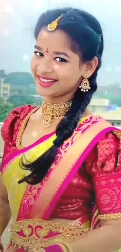 Woman in colorful traditional attire with jewelry, smiling.