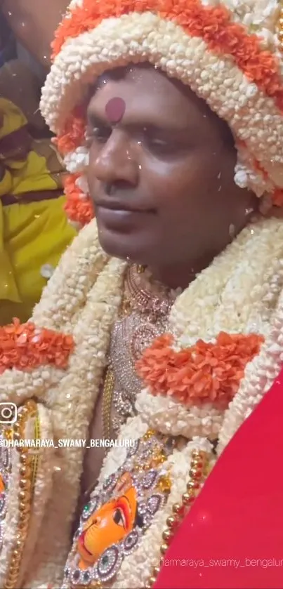 Person in traditional attire adorned with ornate decorations.