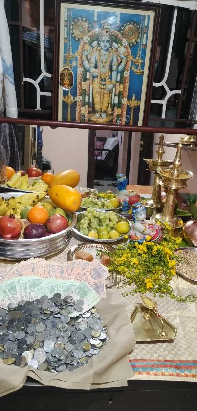 Colorful Indian festival setup with fruits and coins.