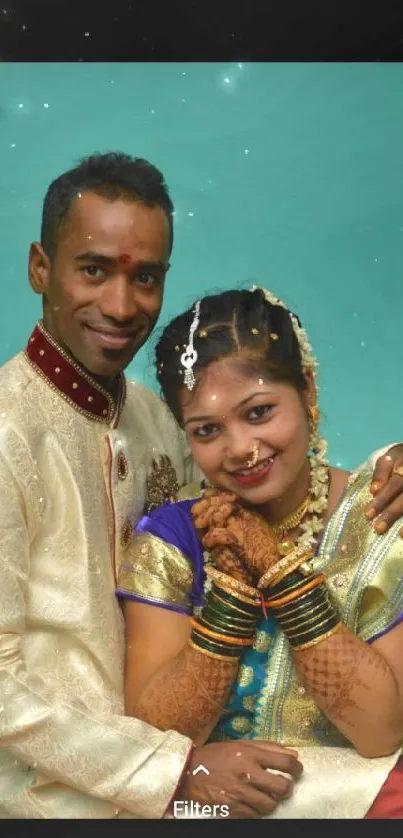 Joyful Indian couple in traditional attire at wedding.