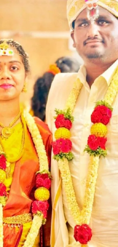 Traditional Indian wedding couple with garlands.