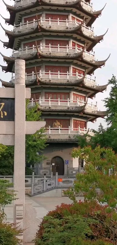 Traditional Asian pagoda surrounded by lush greenery.