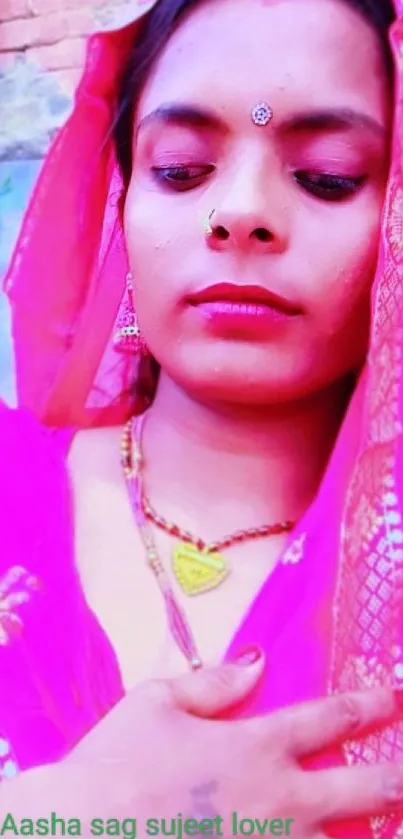 Portrait of woman in vibrant pink traditional attire