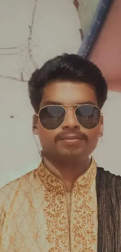 Traditional attire portrait with sunglasses on mobile wallpaper.