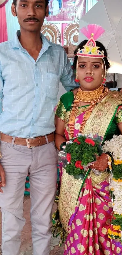 Traditional wedding couple in colorful attire.