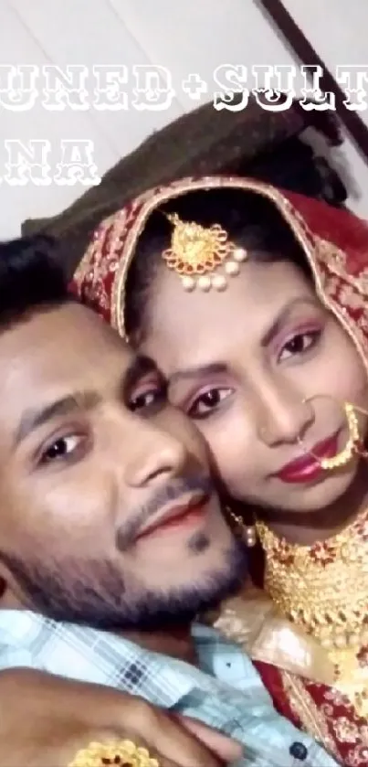 Traditional Indian wedding couple portrait with intricate jewelry.