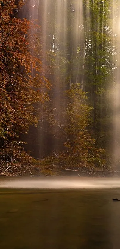 Mobile wallpaper featuring a serene autumn waterfall in a green forest.