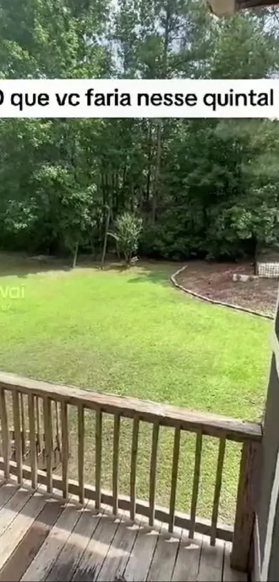 A tranquil view of a green backyard from a wooden deck.